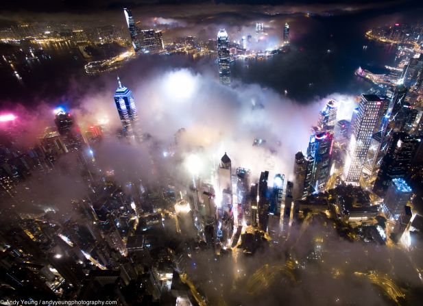 "I've seen a lot of amazing fog-themed photographs taken in the daytime during the fog season," Yeung says. "I thought it would be interesting to capture Hong Kong in the thick mist at nighttime."