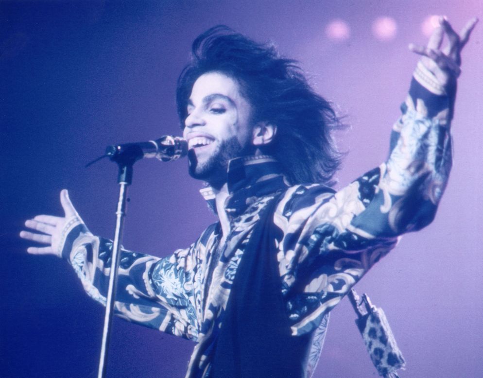 The singer's predilection for lavishly kinky story-songs earned him the nickname "His Royal Badness." He is also known as the "Purple One" because of his colorful fashions. He is seen here in 1990.