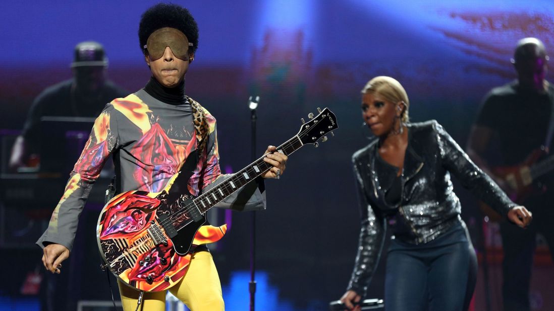 Prince on stage with singer Mary J. Blige during the 2012 iHeartRadio Music Festival in Las Vegas.