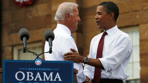 Then U.S. Sen. Barack Obama shakes hands with his Vice Presidential pick Sen. Joe Biden in front of the Old State Capitol August 23, 2008, in Springfield, Illinois.  
