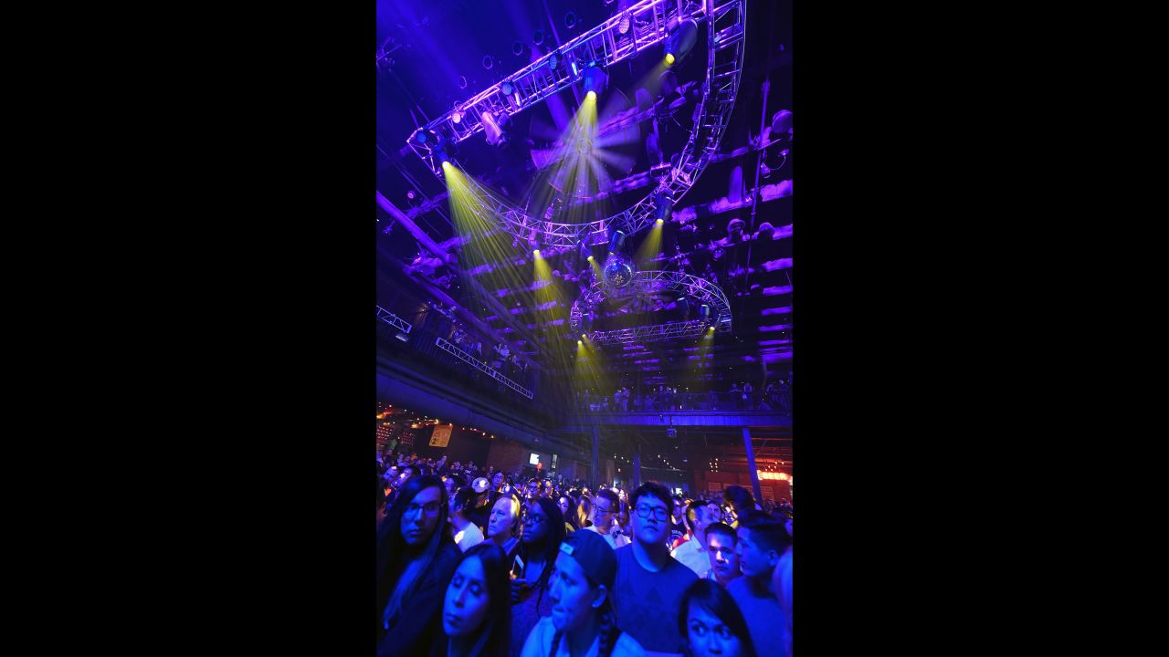 Purple lights illuminate the ceiling and crowd at Brooklyn Bowl Las Vegas as fans wait for a concert by Chvrches and Wolf Alice on April 21.