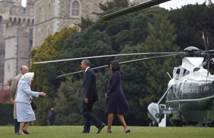 Obama and the first lady are greeted by Queen Elizabeth II and Prince Phillip after landing by helicopter at Windsor Castle for a private lunch on April 22, 2016. 