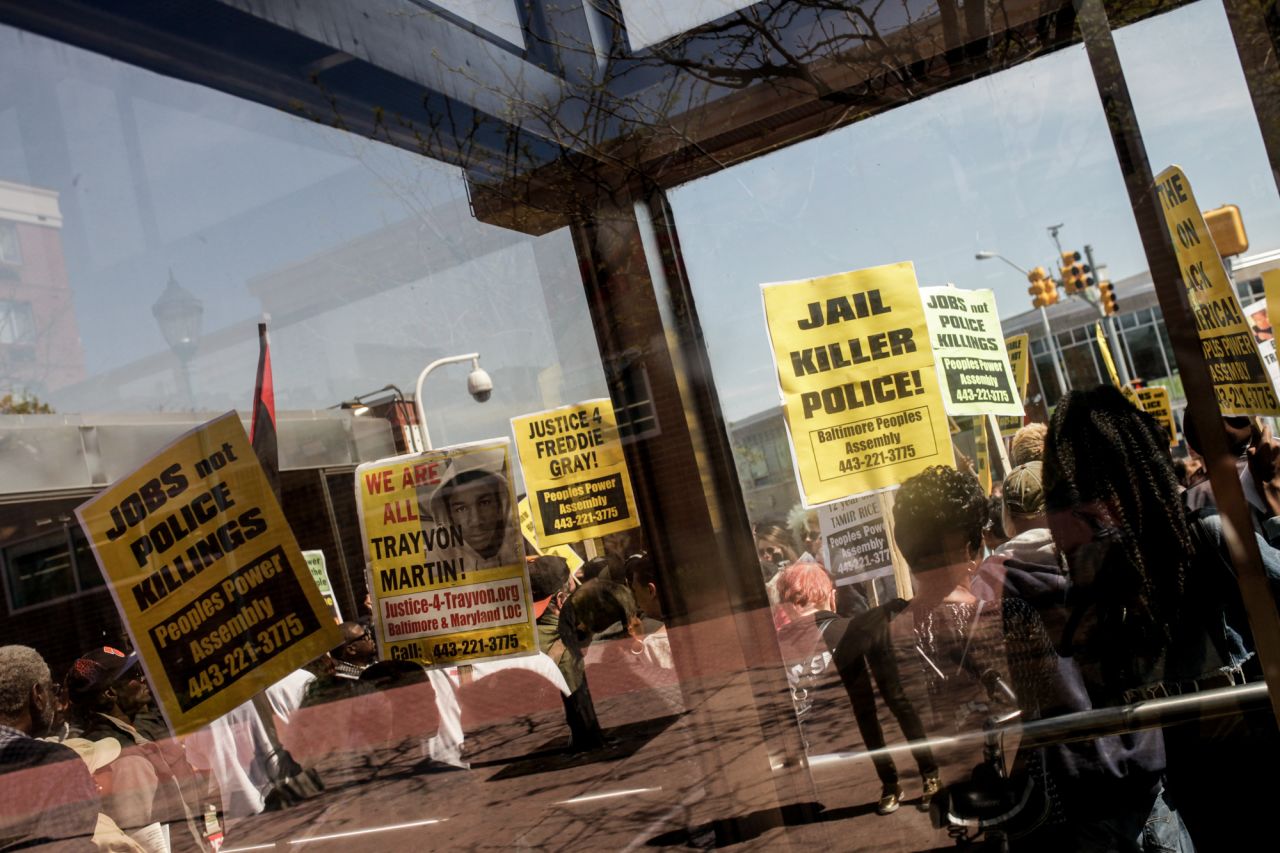 Protesters gather at the corner of Pennsylvania and North Avenue to commemorate the one-year anniversary of the riots. That corner, which was the epicenter of the unrest, is the nerve center of West Baltimore.