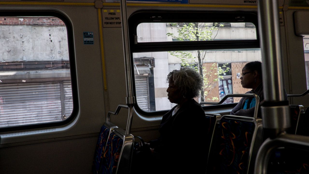 Black residents in West Baltimore are cut off from much of the rest of the city because mass transit is spotty. Here passengers ride light rail. Baltimore's mass transit system isn't controlled by city leaders but by the state.