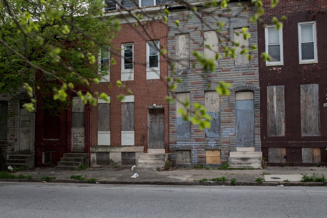 Baltimore has an estimated 18,000 vacant buildings. The city, built for a million people, now has about 600,000 residents, and many homeowners have  died or moved away. The city has a new program to demolish vacant homes.