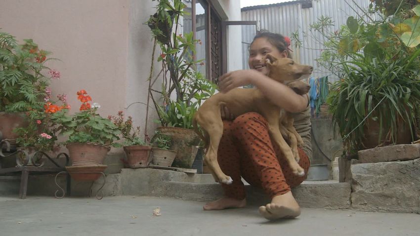 Nepal earthquake anniversary girl leg Kathmandu ns orig_00015209.jpg