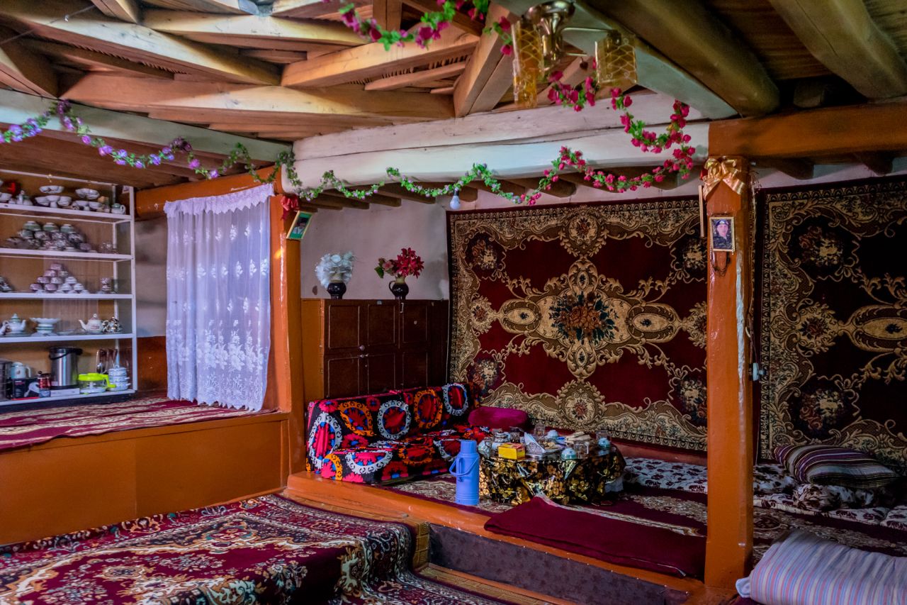 The interior of a traditional Pamiri house. Symbols and elements of their Ismaili religion dominate the design.