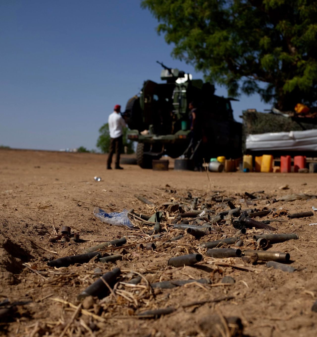 Empty ammunition cases litter the ground, untouched since they flew from the machine guns used in a skirmish between the Nigerian army and Boko Haram fighters. 
