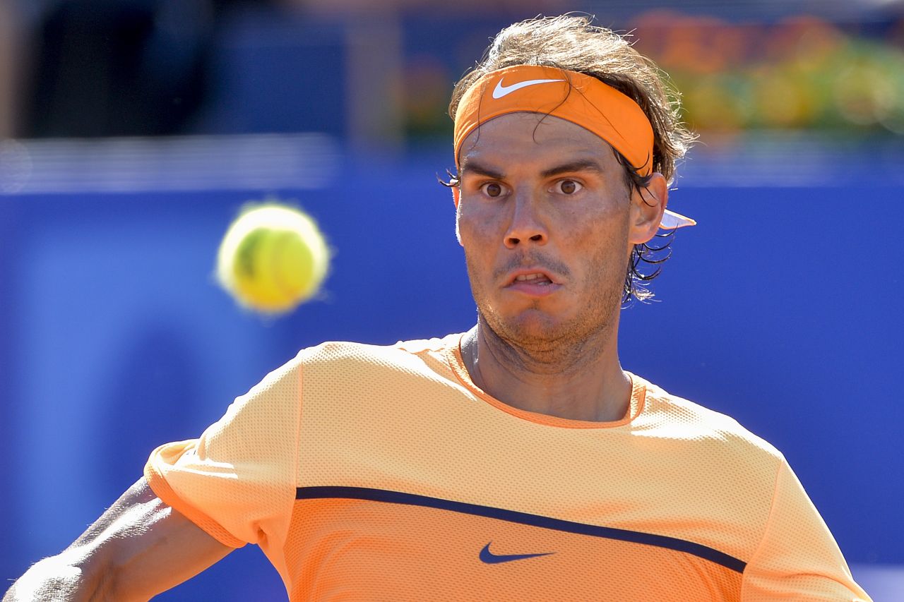 Rafael Nadal eyes up a shot as he faces off against Philip Kohlschreiber in the semifinal of the Barcelona Open.