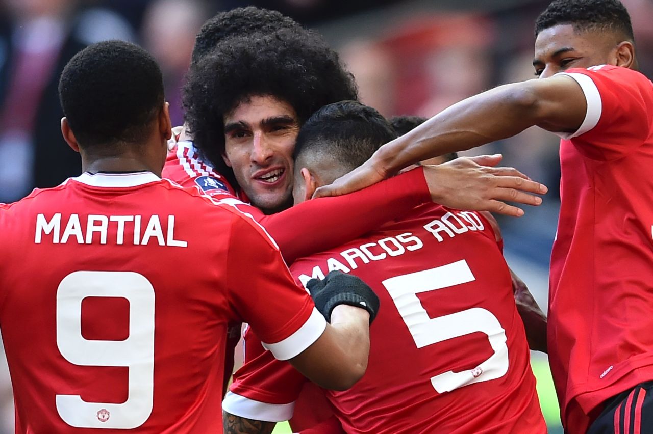 Marouane Fellaini (2L) opened the scoring for United in the first half.
