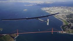 Solar Impulse 2, a solar powered plane, flies over the Golden Gate Bridge in San Francisco on Saturday, April 23.