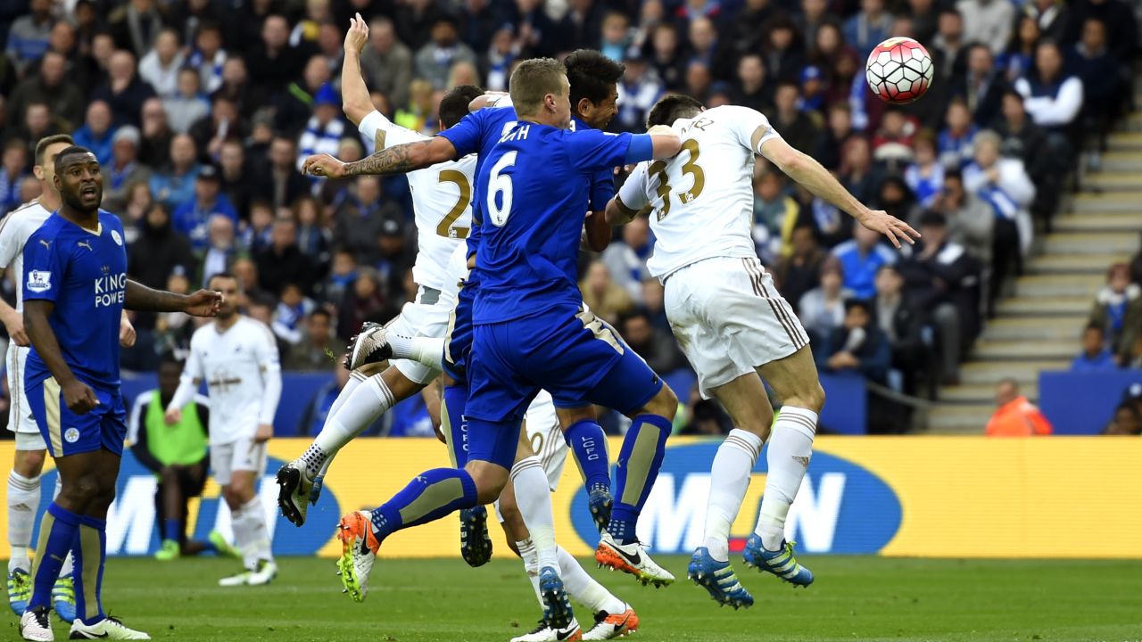 Leonardo Ulloa heads Leicester's second goal just before halftime in the 4-0 win over Swansea City.