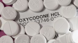 Still life. Oxycodone. Oxycodone is a narcotic pain reliever. Oxycodone has a high abuse potential and is prescribed for moderate to high pain relief associated with injuries, bursitis, dislocation, fractures, neuralgia, arthritis, and lower back and cancer pain. OxyContin, Percocet, Percodan, and Tylox are trade name oxycodone products. (Photo by: Education Images/UIG via Getty Images)