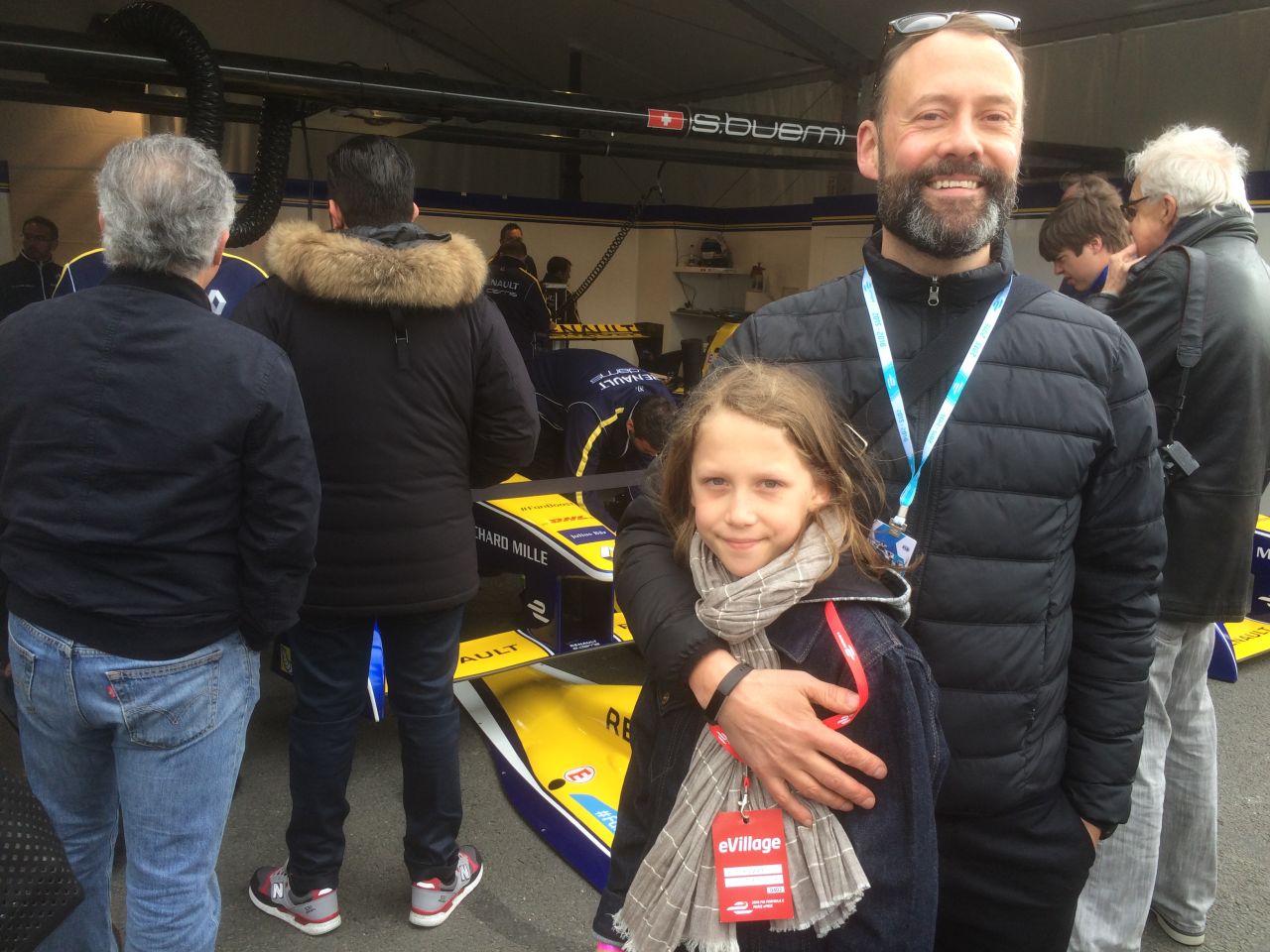 "Formula E is what got me into cars," explains Milo from London, who is seen outside the garage of his favorite driver, Sebastien Buemi, in Paris. Dad Hector says his son discovered Formula E by watching online.