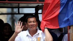 In this photo taken on March 2, 2016, shows Davao City Mayor and Presidential Candidate Rodrigo Duterte waves to his supporters during his campaign sortie in Lingayen, Pangasinan, north of Manila.
Rodrigo Duterte curses the pope's mother and jokes about his own infidelities, but many voters in the Philippines want to elect him president so he can begin an unprecedented war on crime. / AFP / NOEL CELIS / TO GO WITH AFP STORY: Philippines-vote-rights-crime-Duterte, FOCUS by Karl Malakunas        (Photo credit should read NOEL CELIS/AFP/Getty Images)