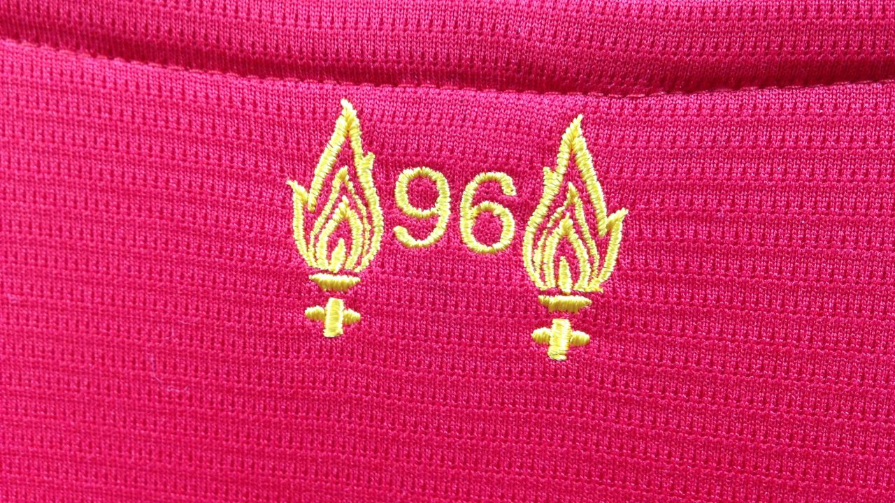 The 2015-16 Liverpool shirt commemorates the 96 lives lost with this stitching below the collar.