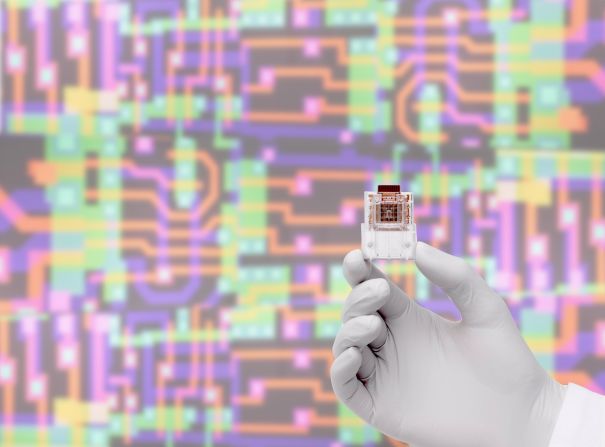 Professor Chris Toumazou pioneered a wave of multidisciplinary study and discovery within electronics, biology, genetics and health care -- including his "lab-on-a-chip," pictured.