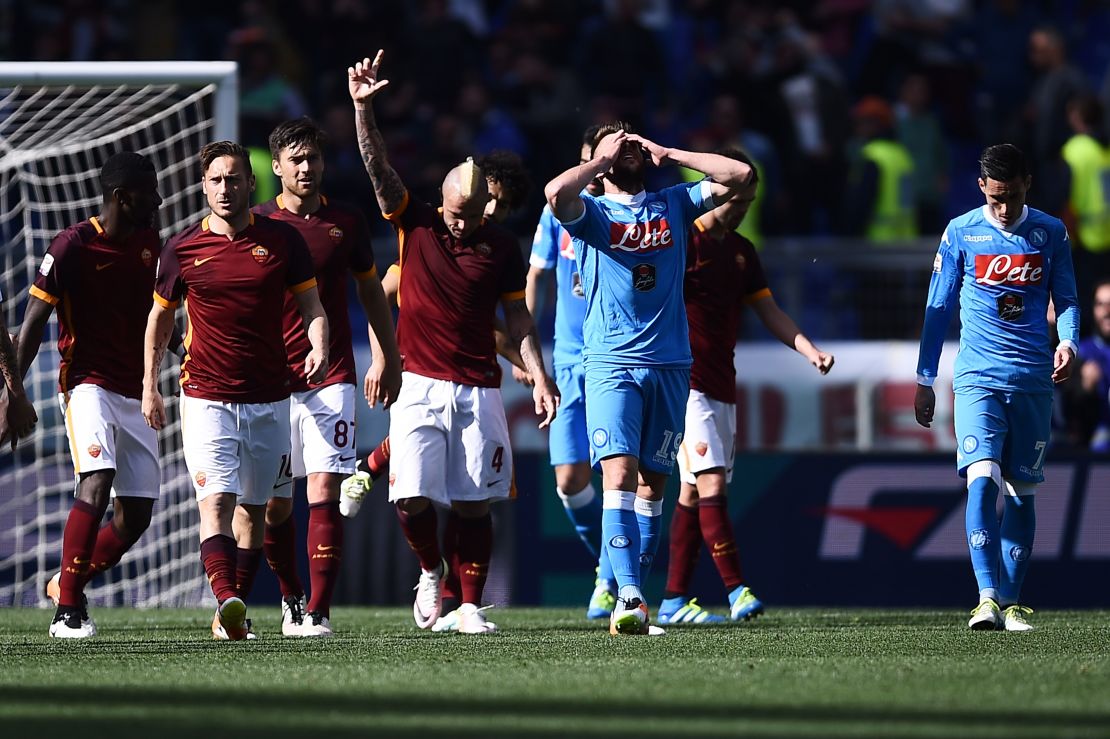 Roma's midfielder Radja Nainggolan celebrates after his goal ended Napoli's slim title hopes.