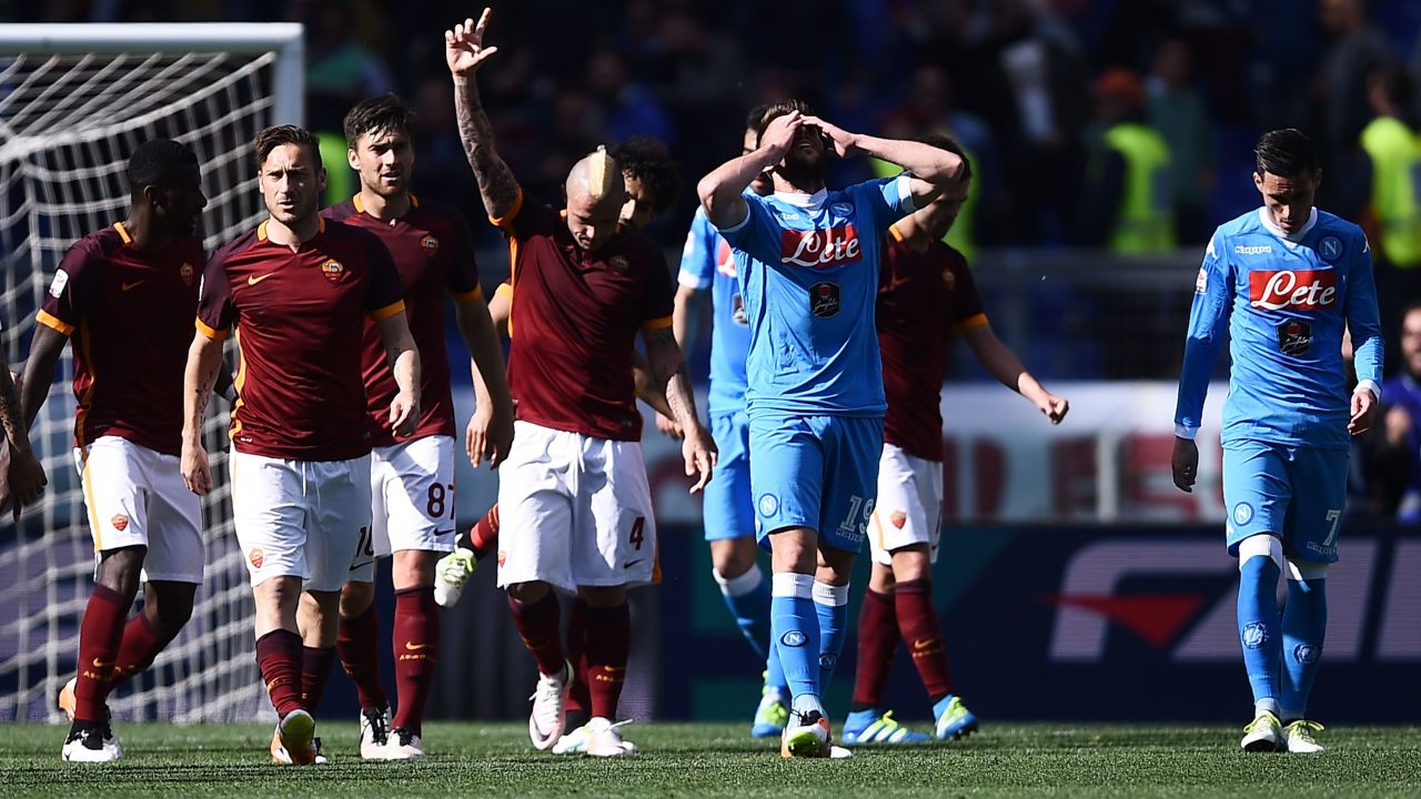 Roma's midfielder Radja Nainggolan celebrates after his goal ended Napoli's slim title hopes.