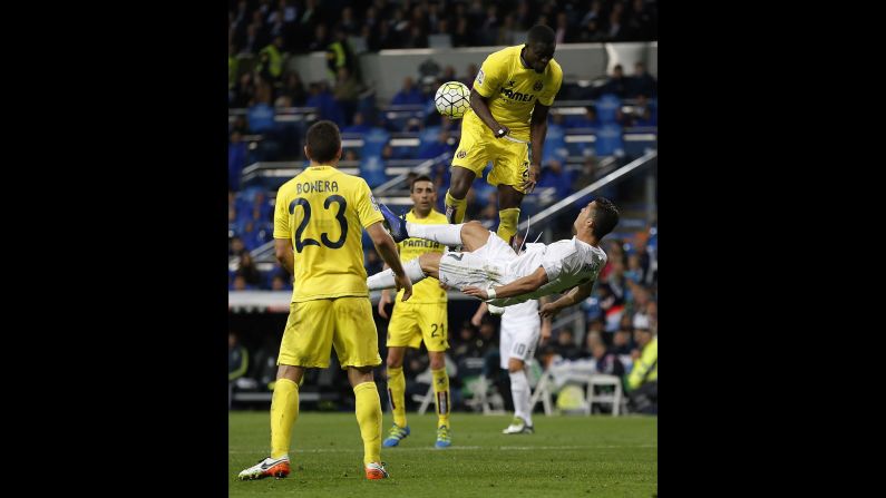 Real Madrid superstar Cristiano Ronaldo, right, competes with Villarreal's Eric Bailly during a Spanish league match in Madrid on Wednesday, April 20.