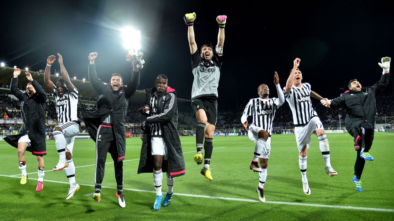 Juventus players celebrate their <a href="http://www.cnn.com/2016/04/25/football/juventus-serie-a-napoli-roma/" target="_blank">fifth straight Italian league title</a> after a 2-1 victory at Fiorentina on Sunday, April 24. 