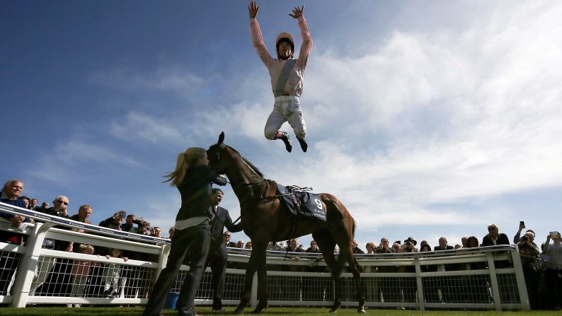 Frankie Dettori celebrates Wednesday, April 20, after riding So Mi Dar to win the Investec Derby Trial in Epsom, England.