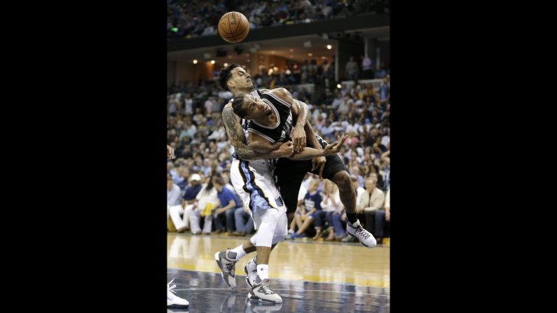 Memphis forward Matt Barnes fouls San Antonio's Kawhi Leonard during an NBA playoff game in Memphis, Tennessee, on Friday, April 22. San Antonio would go on to sweep the Grizzlies and advance to the second round.