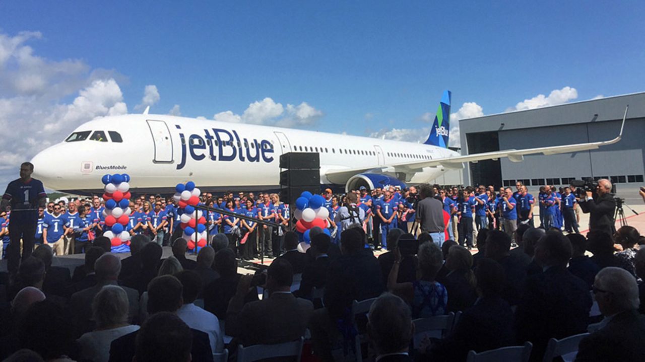 Employees and guests in Mobile, Alabama, on Monday gather around BluesMobile, the first Airbus assembled in the U.S.