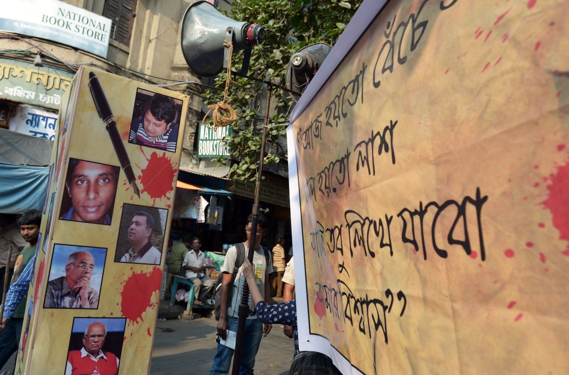 A protest poster with pictures of recently murdered Bangladeshi bloggers.