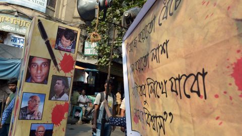 A protest poster with pictures of recently murdered Bangladeshi bloggers.