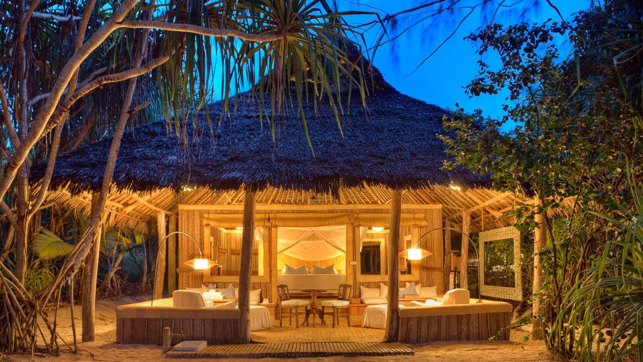 Mnemba Island's guests stay in luxury versions of traditional beachside bandas.