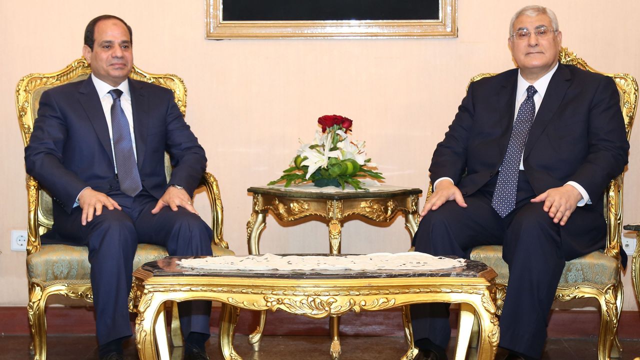 Sisi, left, is sworn in as President on June 8, 2014, with former interim President Adly Mansour.