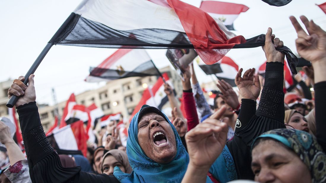 Egyptians celebrate in front of the presidential palace in Cairo in June 2014 after former military chief Abdel Fattah el-Sisi win