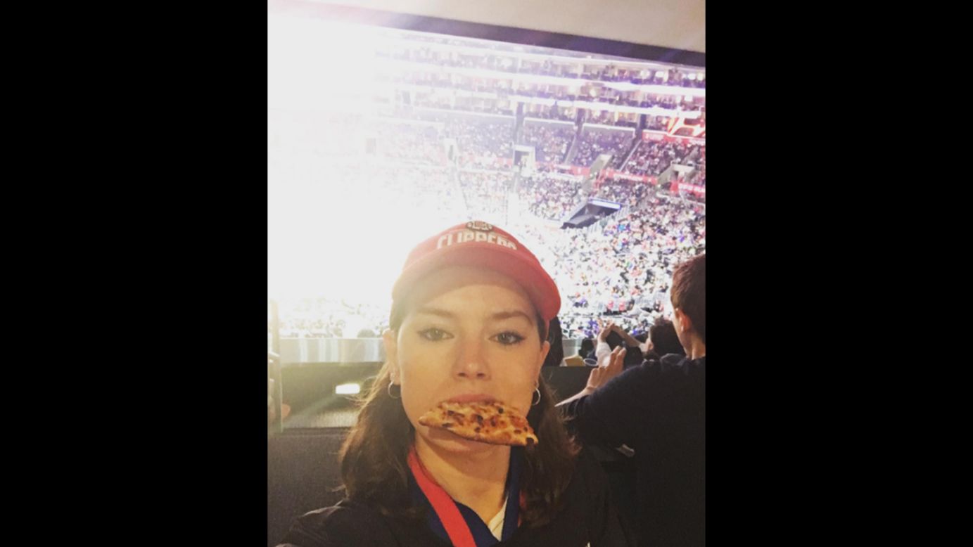 Actress Daisy Ridley enjoys some pizza as she attends her first basketball game on Sunday, April 10. "We tried all sorts of poses but I definitely look best in this glorious selfie," <a href="https://www.instagram.com/p/BECX84CFE4t/" target="_blank" target="_blank">she said on Instagram.</a>
