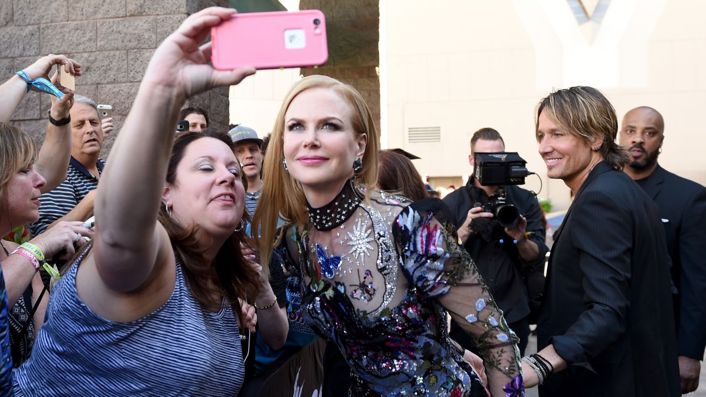 Actress Nicole Kidman poses for a fan's photo at the Academy of Country Music Awards on Sunday, April 3.
