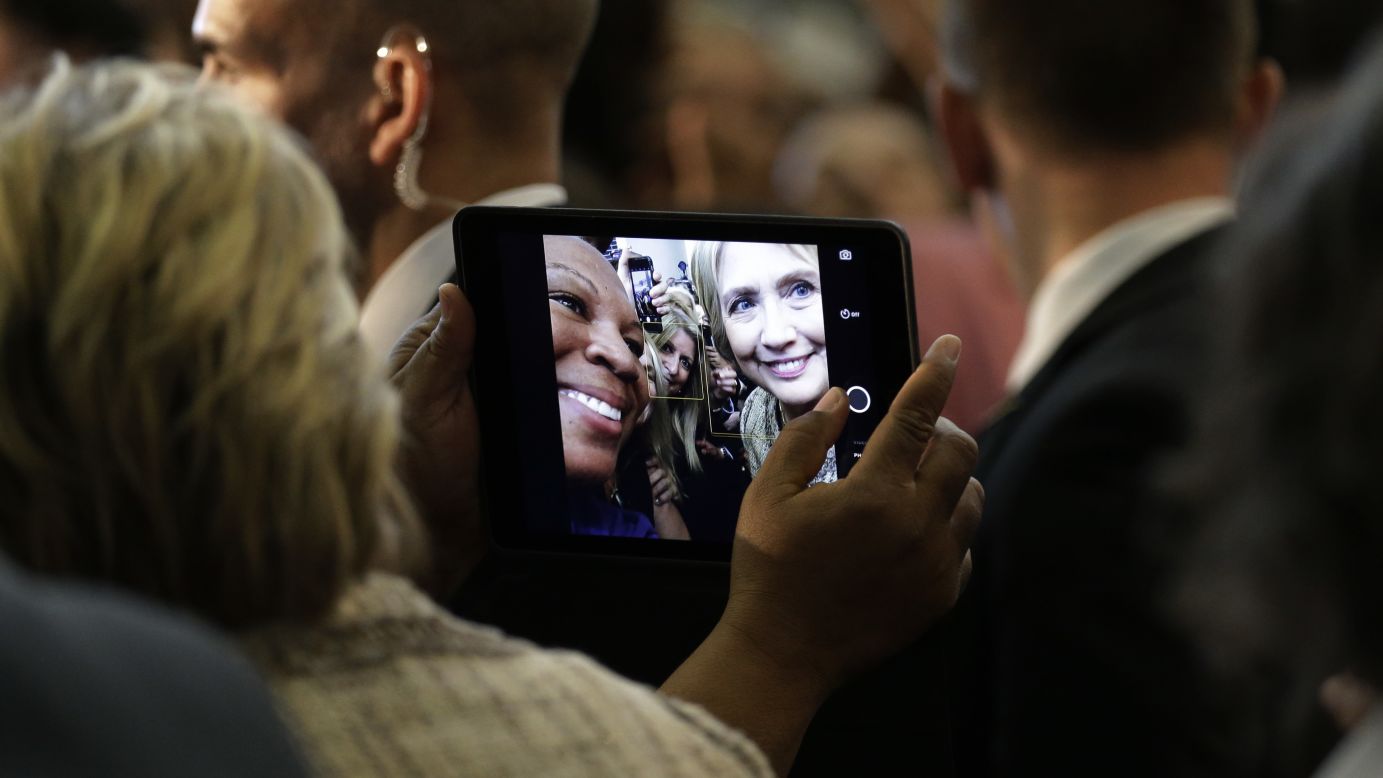 Democratic presidential candidate Hillary Clinton pauses for a selfie at a campaign event in Los Angeles on Saturday, April 16.