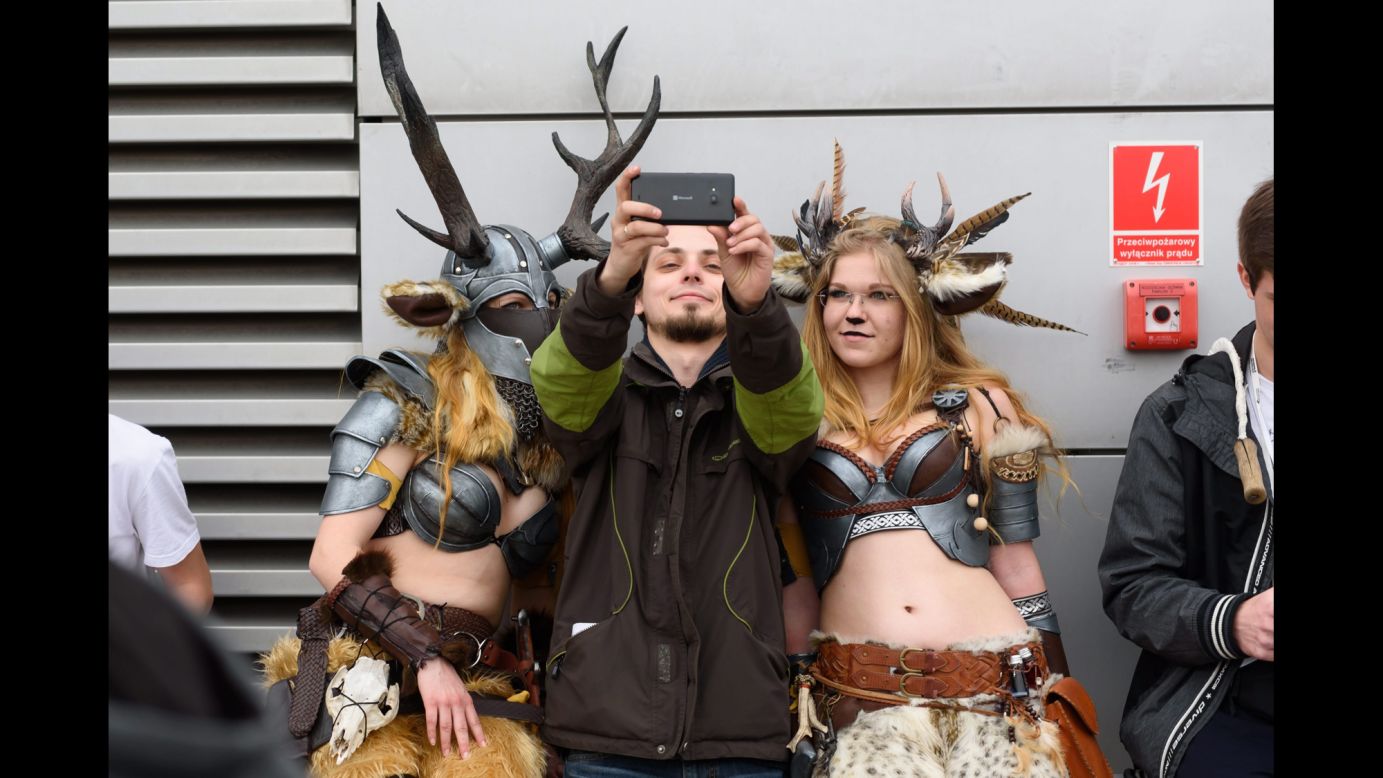 People in costume take a selfie at the Pyrkon Festival, a fantasy convention in Poznan, Poland, on Saturday, April 9.