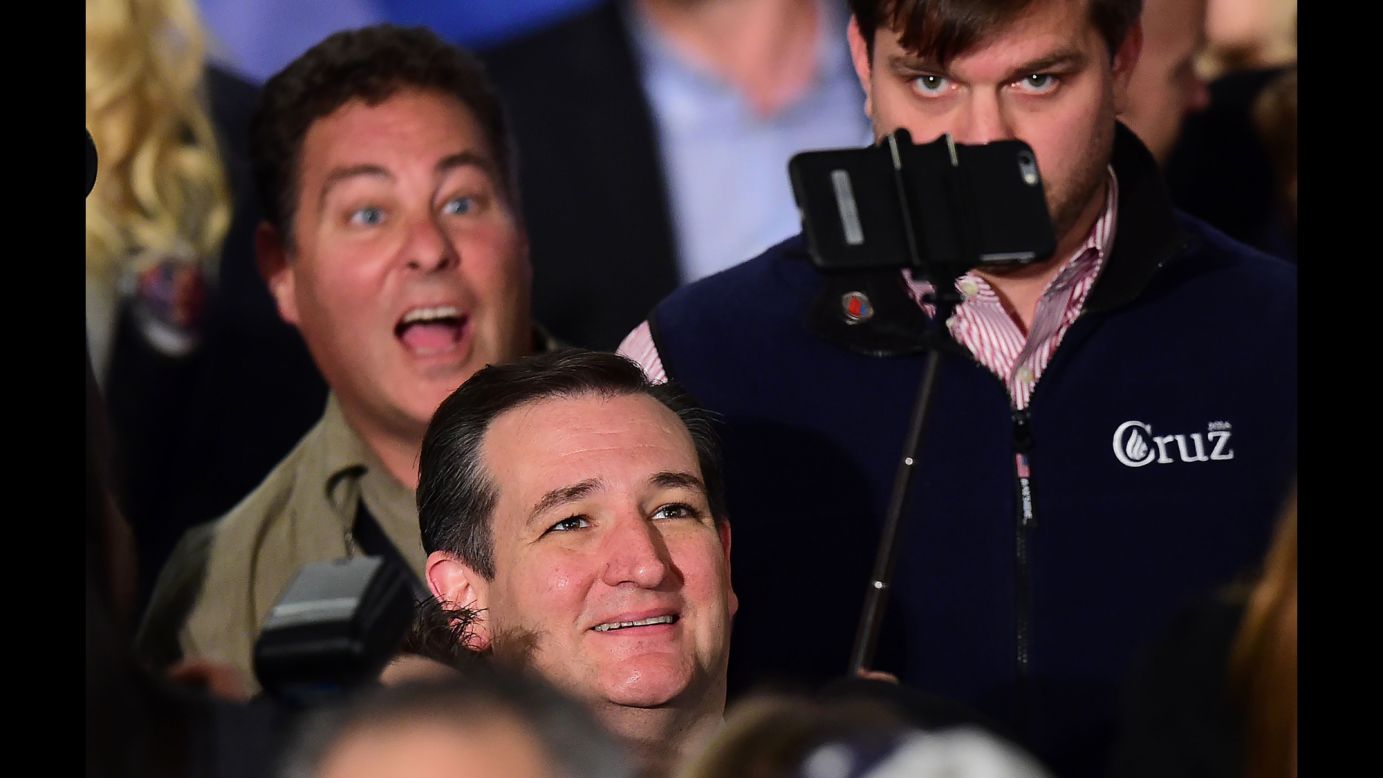 U.S. Sen. Ted Cruz, a Republican presidential candidate, uses a selfie stick during a campaign rally in Irvine, California, on Monday, April 11.