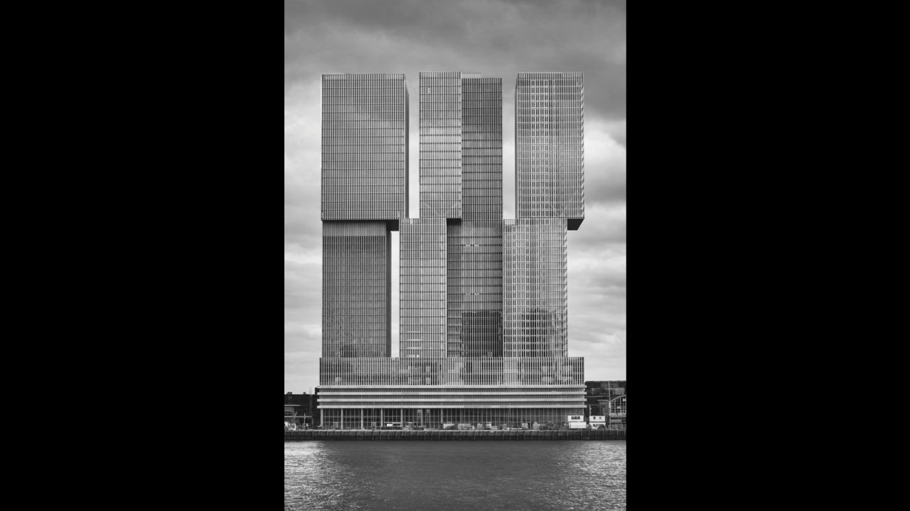 Chadwick argues that Rem Koolhaas' De Rotterdam is another example of contemporary architecture riffing on aesthetics more than half a century old. In essence, he says a Brutalist building is one "avoiding unnecessary details... with a strong form and a lot of straight lines and faceless facades... It's bold, it's domineering; it's an indication that it's aesthetically different with it's surroundings."