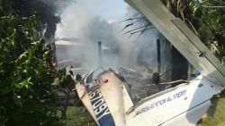 florida plane crashes into house neighbors help pkg_00002526.jpg