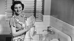 UNITED STATES - CIRCA 1950s:  Woman at sink washing dishes.  (Photo by George Marks/Retrofile/Getty Images)