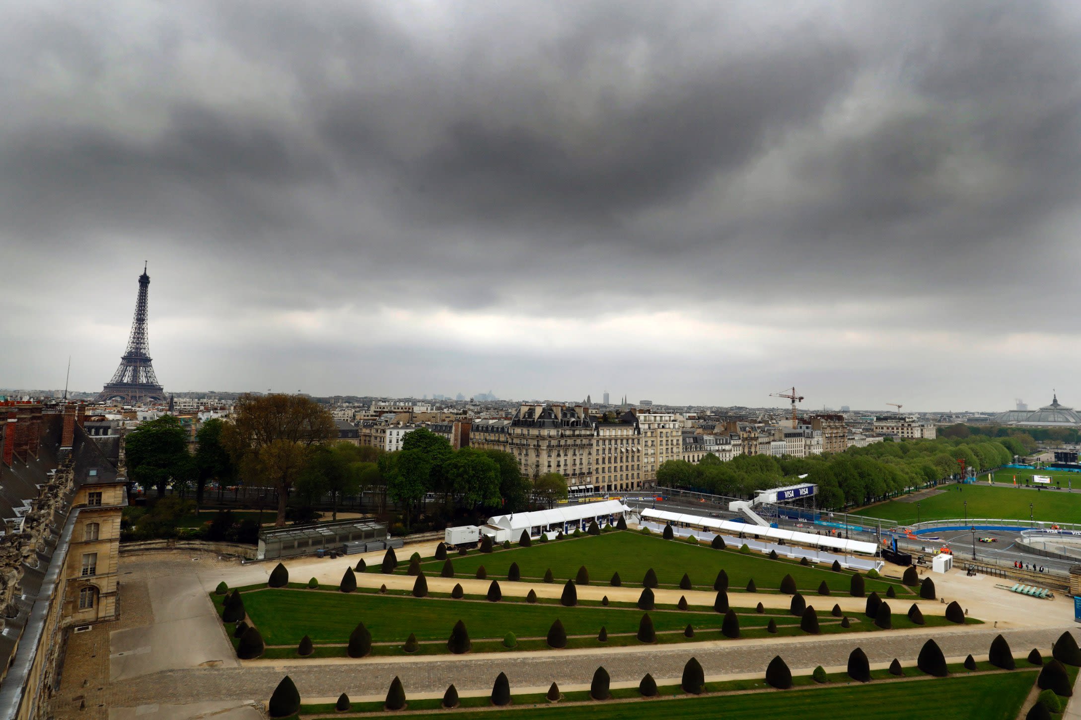The race took place below gray skies but with the spectacular backdrop of the Eiffel Tower. 