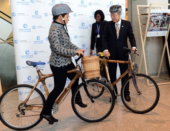 Bamboo bikes are one of the many products made from the sturdy plant which is seeing an economic boom in Asia and Africa. Here UN Secretary General Ban Ki-moon and Christiana Figueres of the United Nations Framework Convention on Climate Change test bamboo bicycles, made by Evelyn Ohenewaa Gyasi from Ghana. 