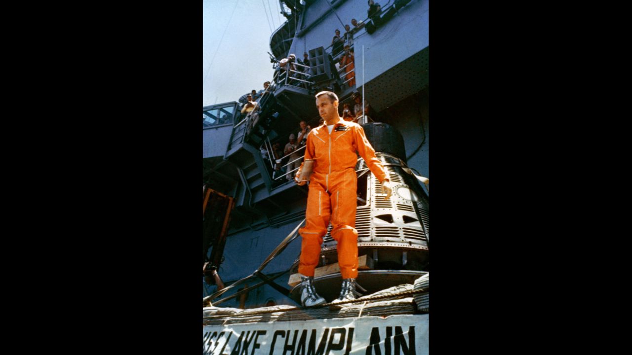Shepard walks away from his Freedom 7 capsule following a post-flight inspection aboard the aircraft carrier. He would visit space again a decade later, walking on the moon as part of the Apollo program. Shepard died in 1998 at the age of 74.