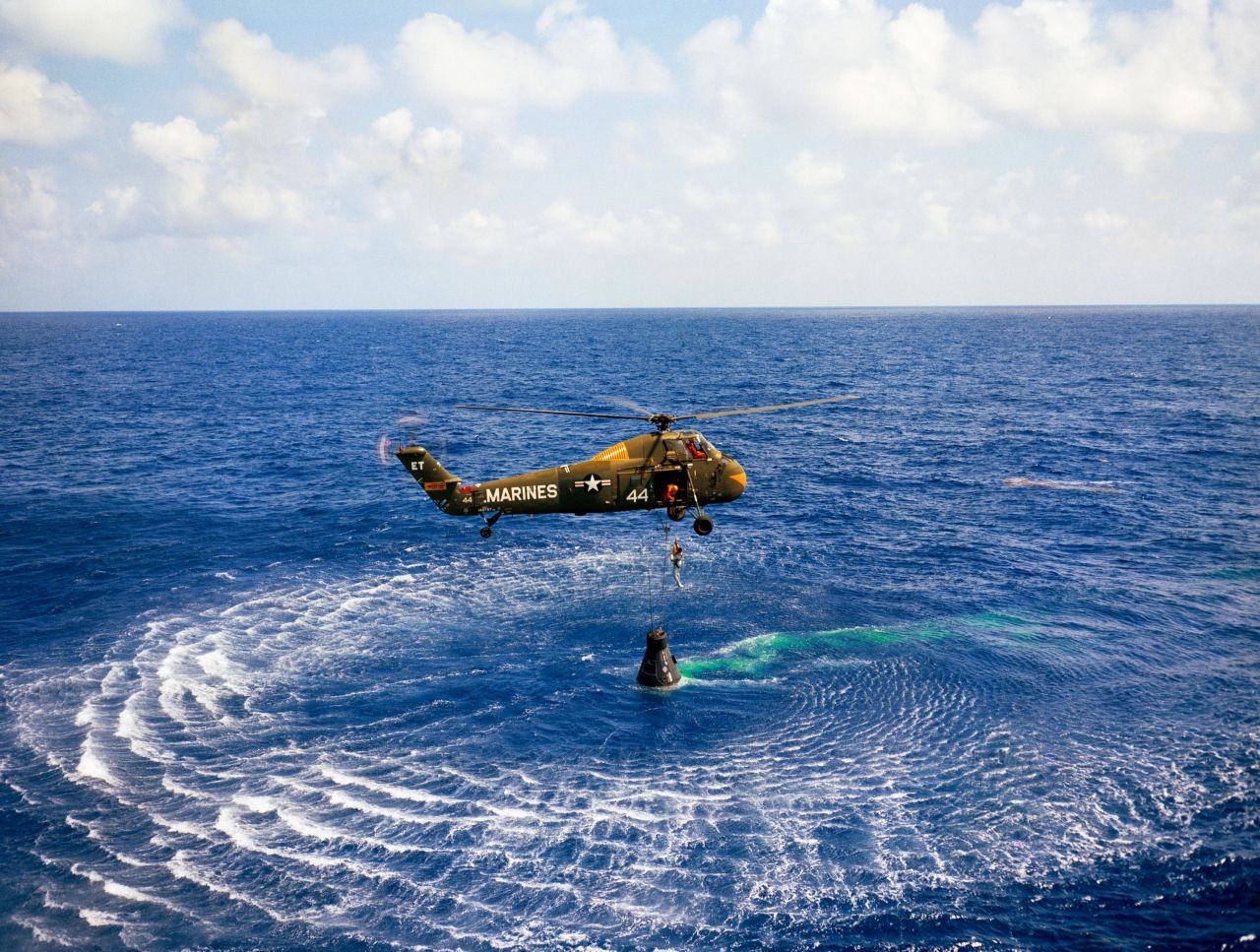 A helicopter picks up Shepard after his capsule landed in the Atlantic Ocean. Engineers said the spacecraft was in such great shape that it could be reused.