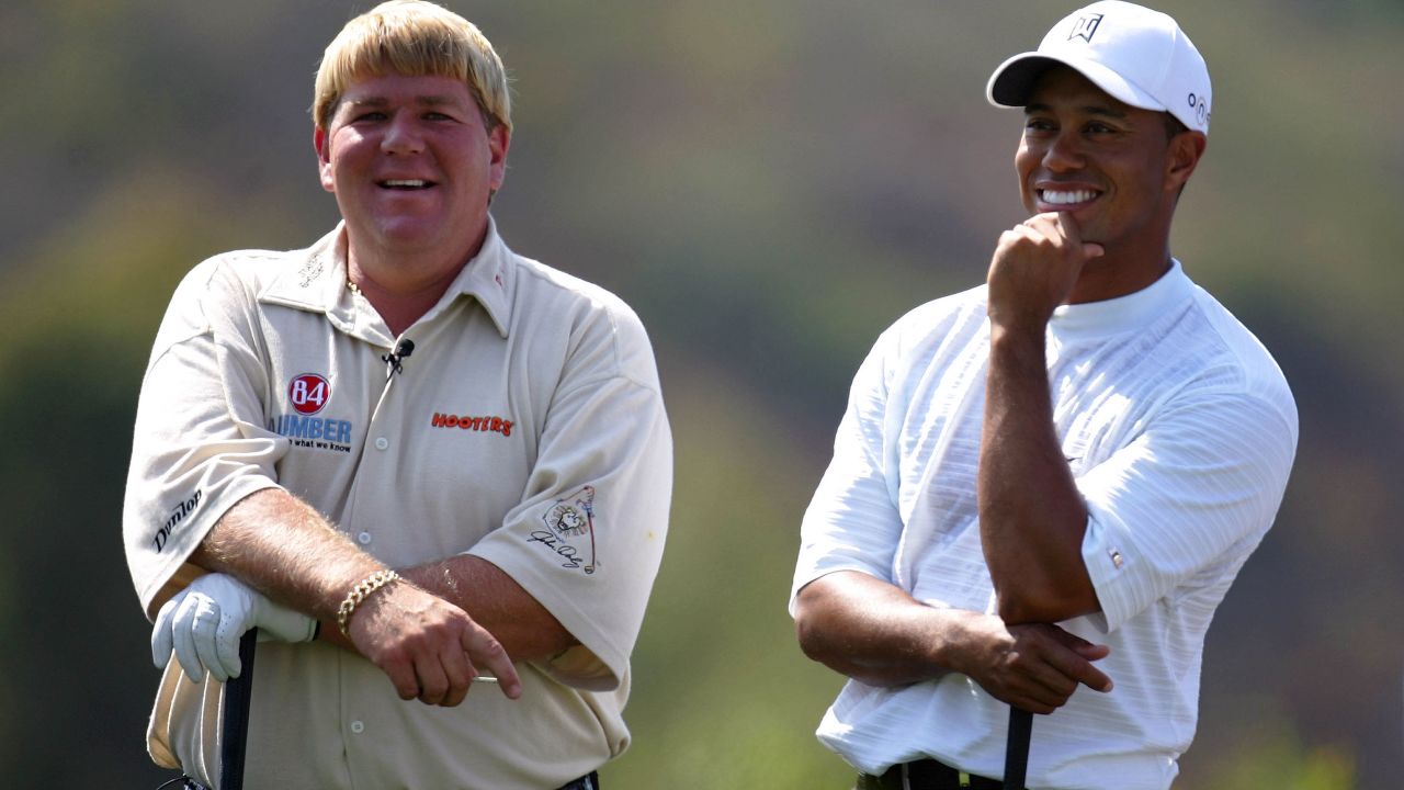 The drinks are on me: John "Wild Thing" Daly and Tiger Woods are both multiple major champions.  