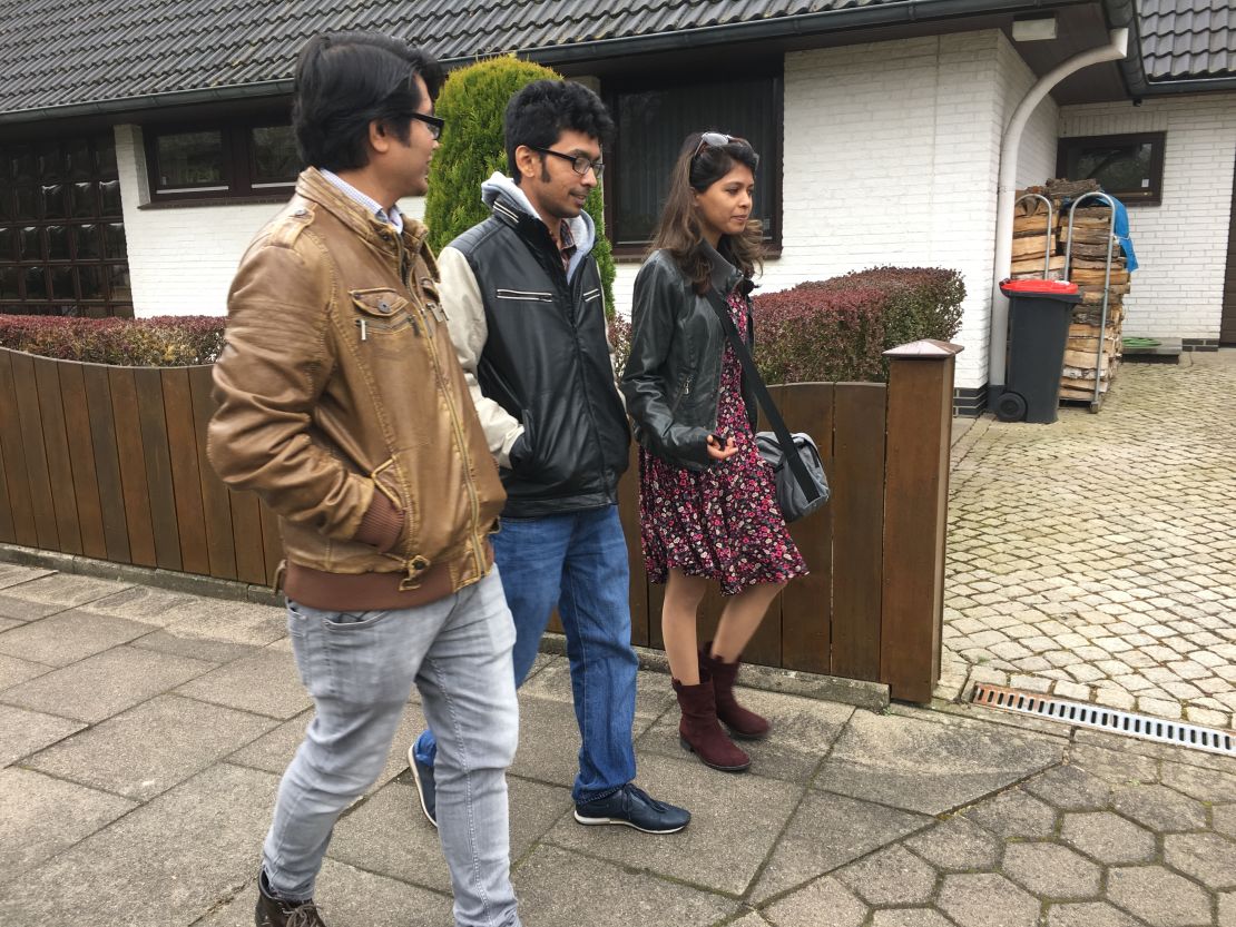 Exiled Bangladeshi blogger Ananya Azad (center) walks with two fellow "free-thinkers" in Germany. 
