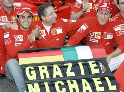 Todt (center) toured the globe as team principal of the Ferrari F1 team from 1994 to 2007. Here he is with drivers Felipe Massa (left) and seven-time world champion Michael Schumacher (right) in 2006.  