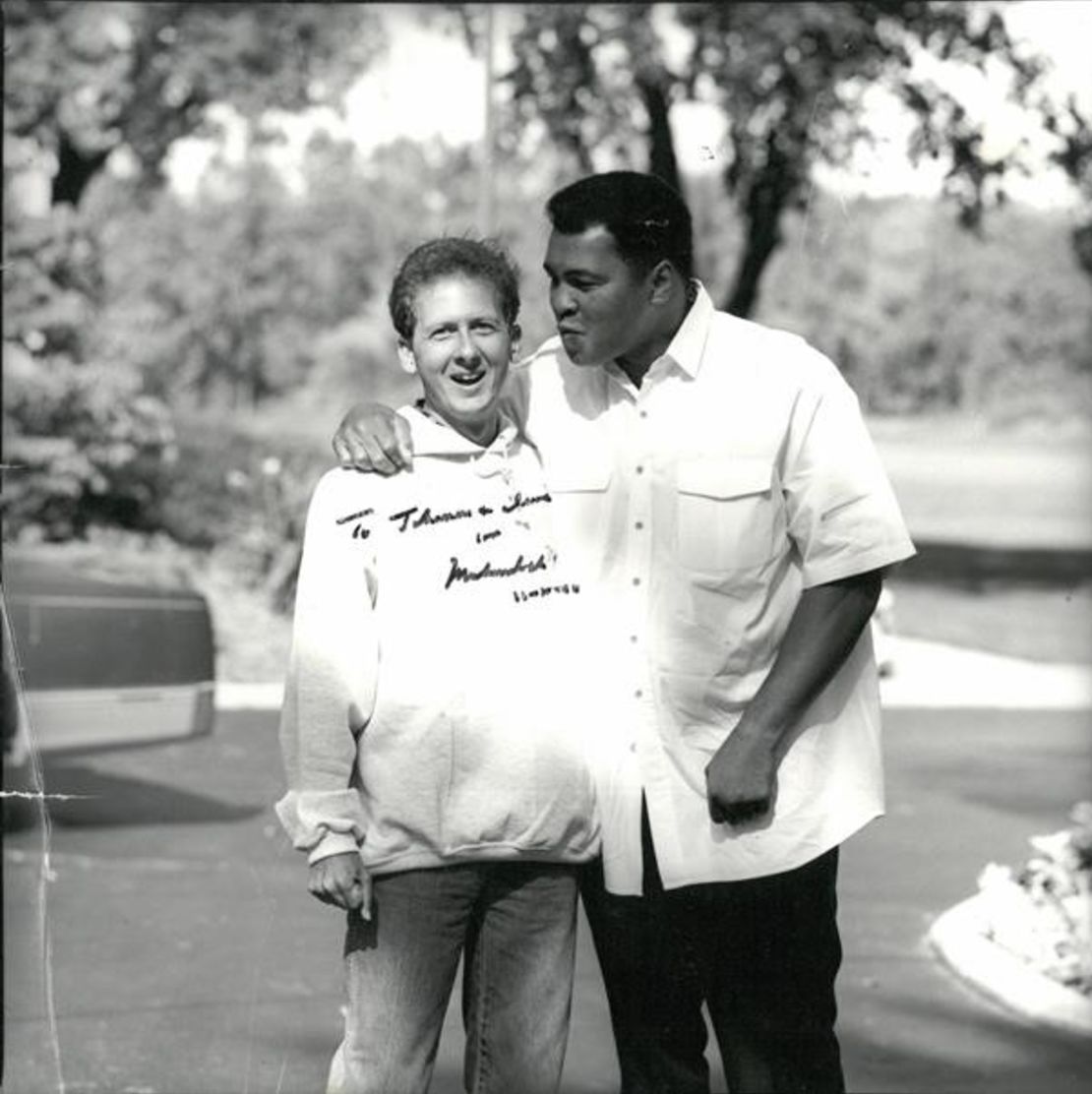 Miller (left) has written a number of books about Ali.