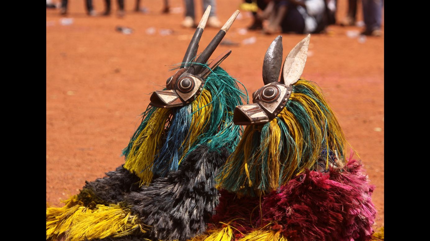Bwa performers in antelope masks bask in the heat. The Bwa from northeast Burkina Faso retain animist traditions, and mask wearers can fall into a trance-like state when invoking spirits.